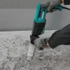 Rotomartillo HR2670 Makita perforando hormigón con accesorio recolector